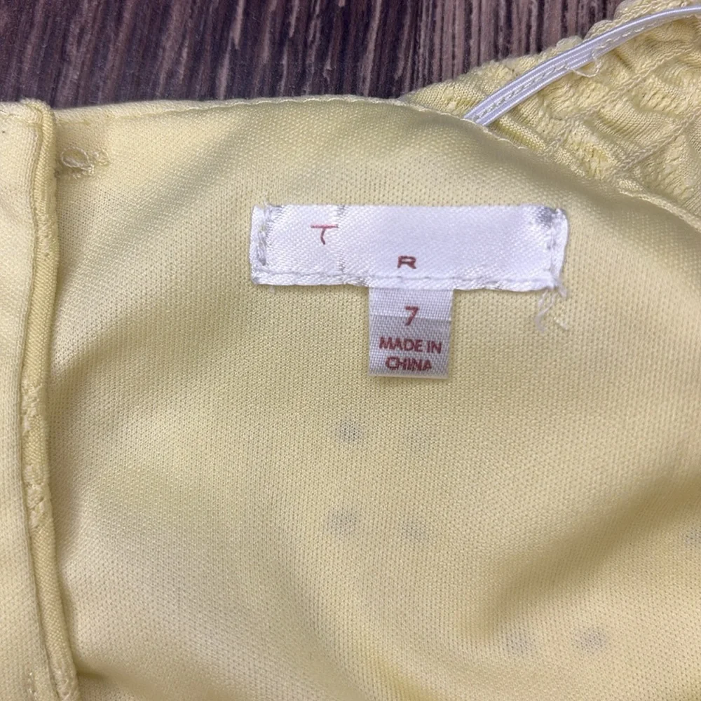 Girls bright yellow dress size 7 with buttons down the back, super cute!!